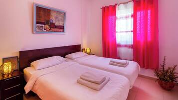 2 slaapkamers, een strijkplank/strijkijzer, gratis wifi, beddengoed