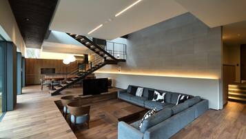 Luxury Villa, Non Smoking | Living room | Fireplace, video game console, heated floors, smart speakers