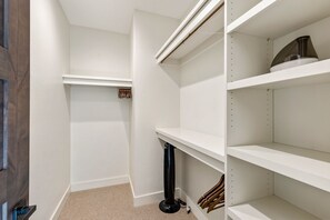 Your personal walk-in closet offers generous shelving and hanging space, keeping everything organized and easy to find during your stay.