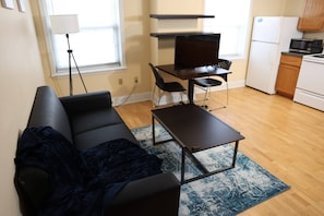 Apartment (2 Bedrooms) | Living room | TV - Close to Campus Student Housing - Amenities (St. Louis)