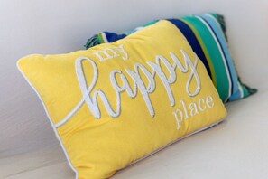 A yellow pillow with the text "my happy place" embroidered on it. - Water View & Access, Game Room~Sunrise~Beach~Kayak Fishing Sleeps 6 (Smyrna)