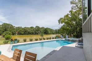 Outdoor pool, a heated pool - 60 S Sea Pines Drive  -  10/10 Rating  -  6 bedrooms / 8 bath home in Sea Pines! (Hilton Head Island)