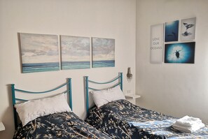 2 bedrooms, desk, iron/ironing board, travel cot
