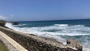 On the beach, sun loungers, beach towels
