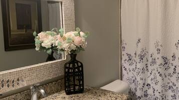 Shower, towels, soap, toilet paper