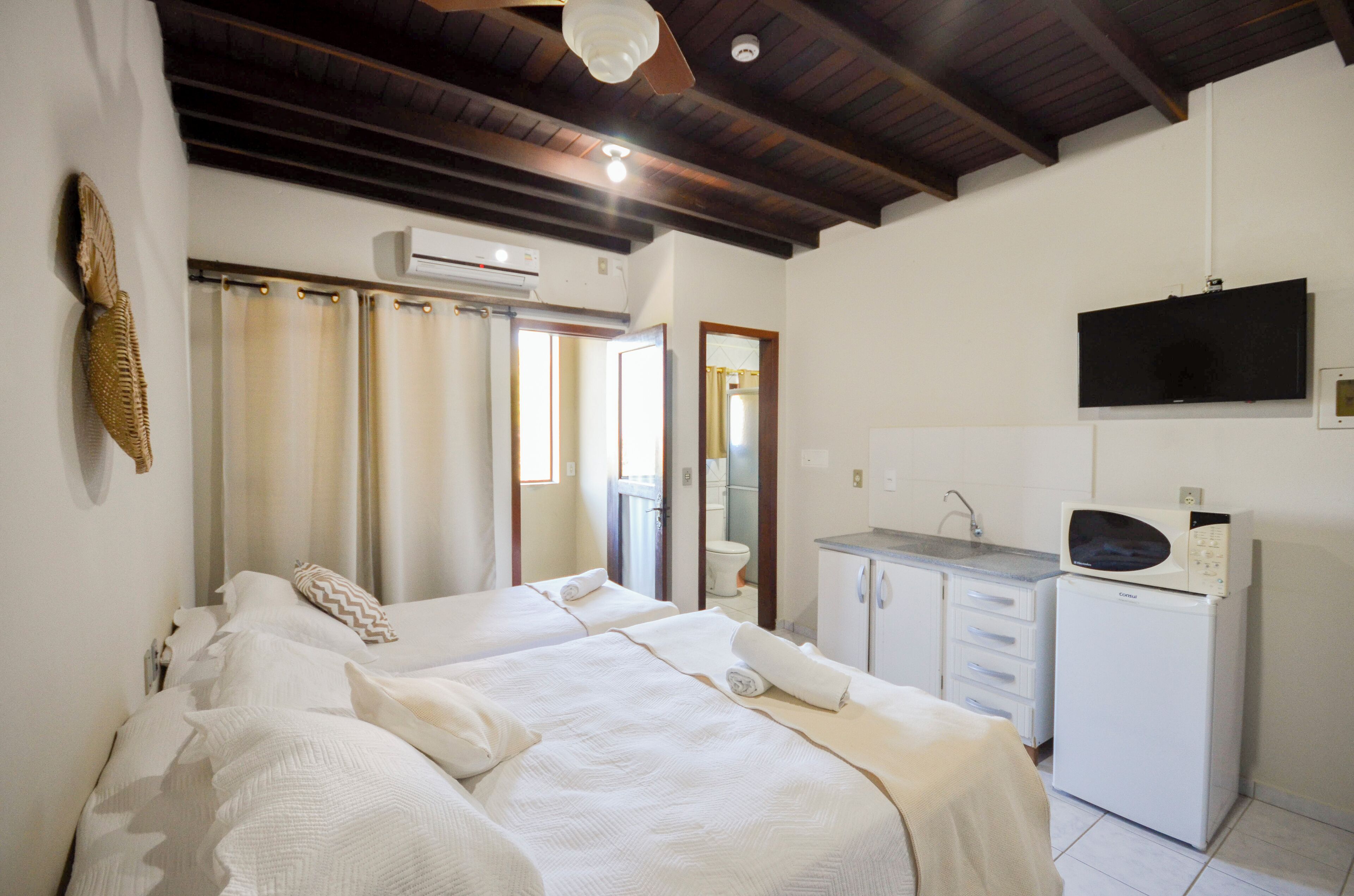 Family Room | Minibar, in-room safe, blackout curtains, free WiFi