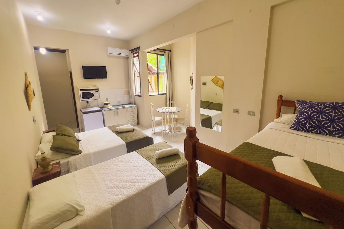 Family Suite, Multiple Beds | Private kitchen | Microwave, cookware/dishes/utensils