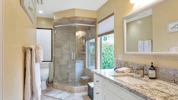 Bathtub, hair dryer, towels, soap