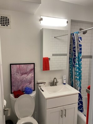 Combined shower/bathtub