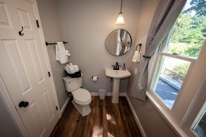 Bathtub, hair dryer, towels, soap