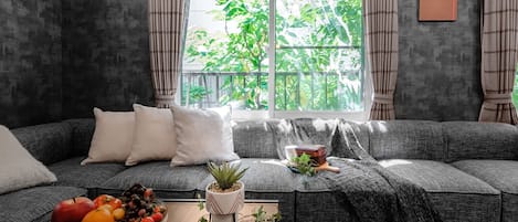 Condo, Non Smoking | Living area | 60-inch flat-screen TV with cable channels, TV, Netflix