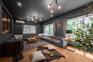 Condo, Non Smoking | Living area | 60-inch flat-screen TV with cable channels, TV, Netflix