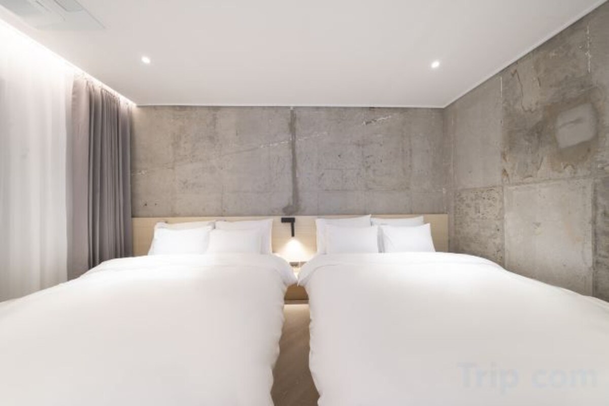 Down comforters, blackout drapes, soundproofing, WiFi (free)