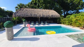 Outdoor pool, a heated pool - POSHPADZ Presents Villa Tranquila- Private Pool & Tiki Close to Beach Sleeps 10 (Jupiter)