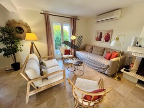 TV, fireplace, books, printers