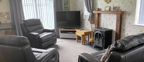 30-inch TV with cable channels, fireplace