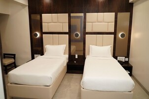 Premium bedding, memory foam beds, minibar, in-room safe