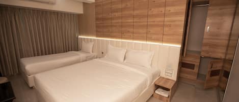 Executive Triple Room | Premium bedding, memory-foam beds, minibar, in-room safe