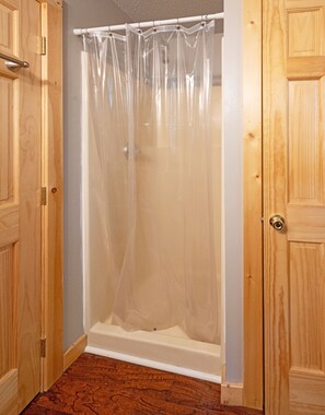Combined shower/bathtub, towels - Lakeside Mountain Oasis - Bedroom Cabin w/ Outdoor Hot Tub (Topton)