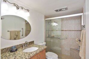 Shower, towels, soap, toilet paper
