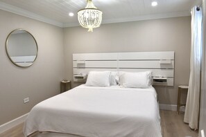 1 habitación, tabla de planchar con plancha y cuna de viaje 