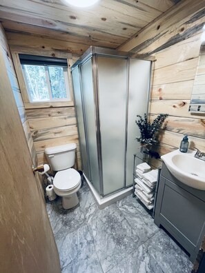 Shower, hair dryer, towels, soap
