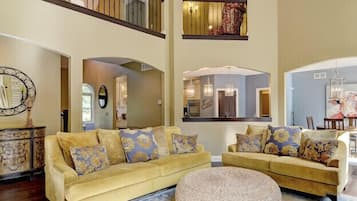 Smart TV, fireplace, books, offices