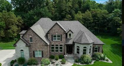 NEW!! Luxury throughout. Sleeps 12. Just 5 miles to ND. Theater. Bar. Hot Tub.