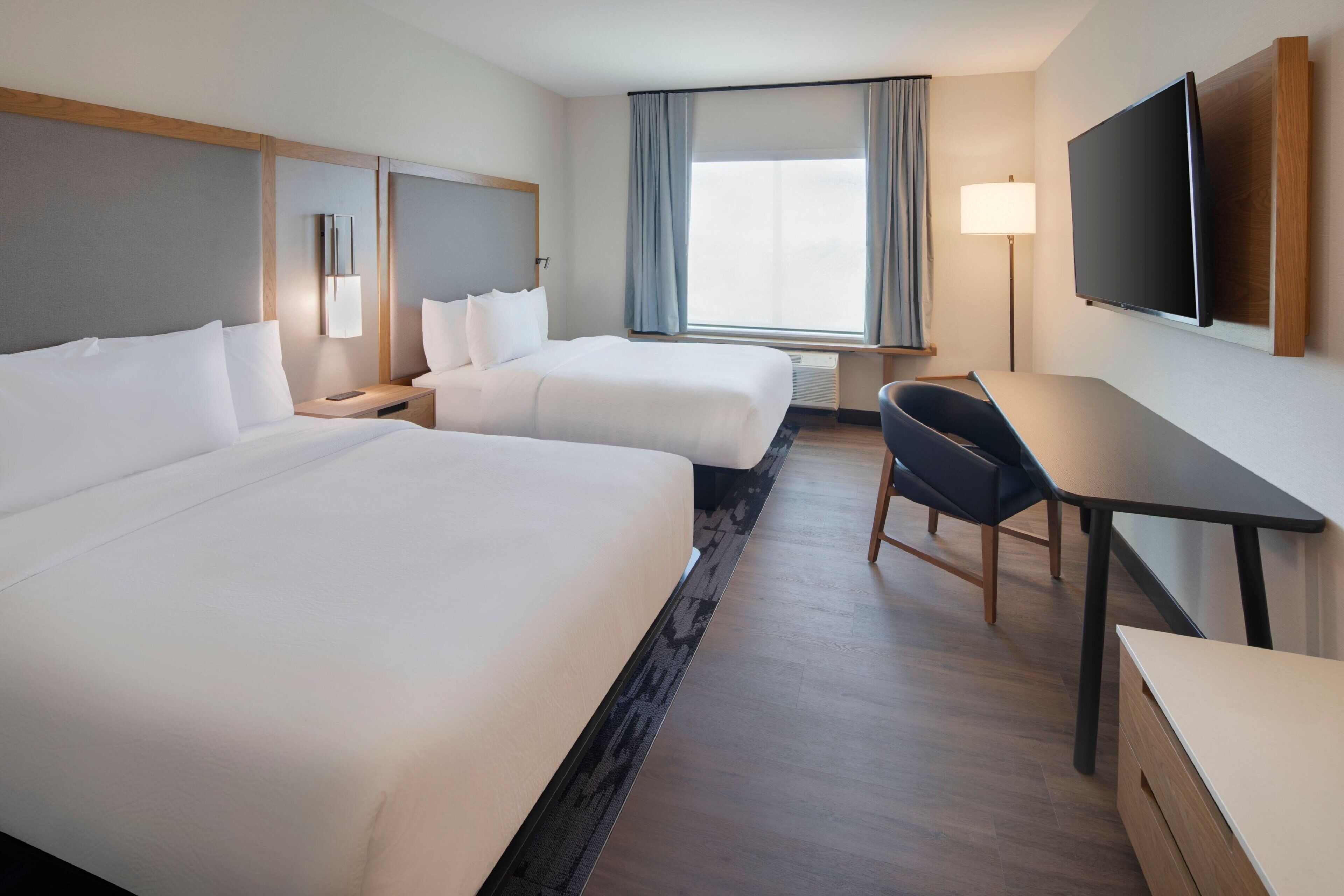 Desk, laptop workspace, blackout curtains, iron/ironing board