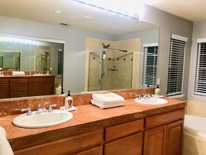 Combined shower/tub, hair dryer, towels, soap