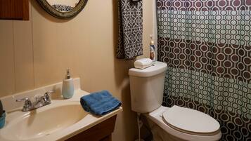 Room, 1 Bedroom, Smoking, Patio | Bathroom | Shower, towels, shampoo