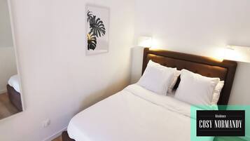 2 habitaciones, tabla de planchar con plancha y wifi gratis