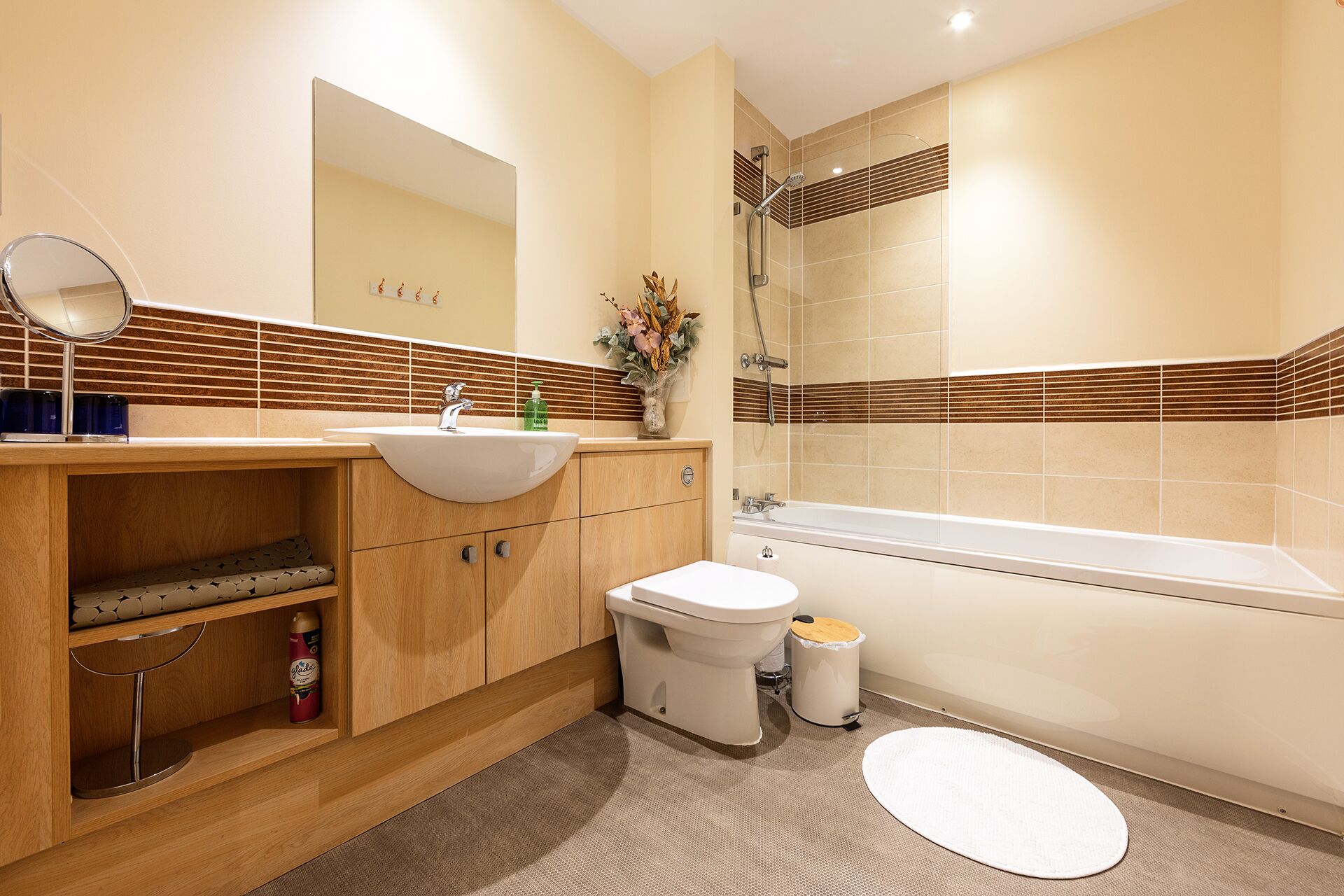 Combined shower/tub, hair dryer, towels, soap