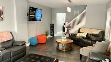 Classic House | Living area | 70-inch flat-screen TV with cable channels, TV