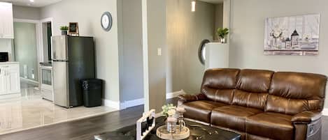 70-inch flat-screen TV with cable channels, TV