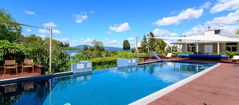 Relax At The Bach - Resort Style Living