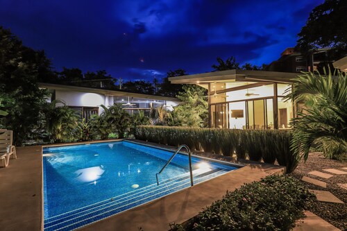 Stylish 2BR Pool Retreat — Walk to Beach