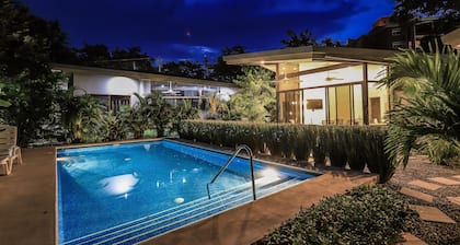 Stylish 2BR Pool Retreat — Walk to Beach