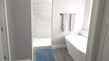 Combined shower/tub, hair dryer, towels, soap