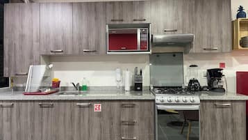 Fridge, microwave, stovetop, cookware/dishes/utensils