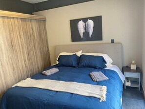 2 habitaciones, tabla de planchar con plancha, wifi y ropa de cama 