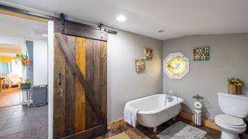 Bathtub, hair dryer, towels, soap