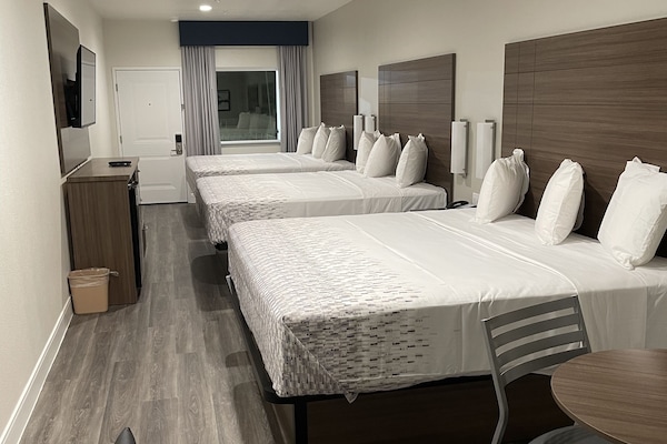 Family Room | Desk, blackout drapes, iron/ironing board, free WiFi