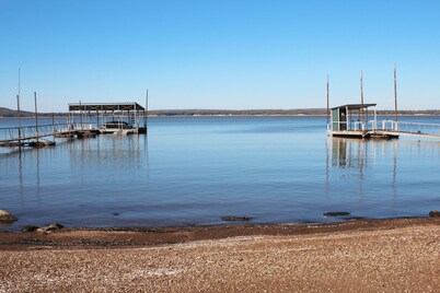 Fun Beachfront Retreat! Amazing View, Huge Covered Porch, EV Charger, and more!