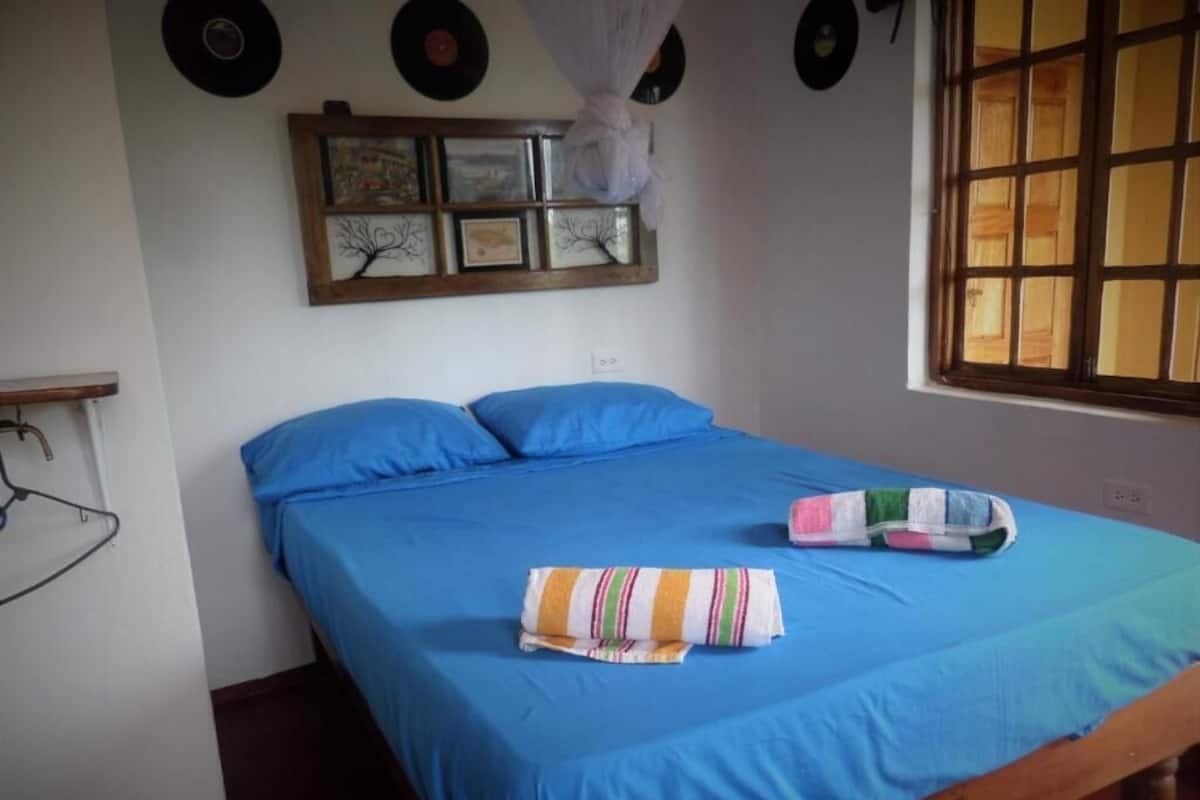Basic Double Room | Iron/ironing board, bed sheets