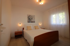 2 chambres, coffre-fort, lit de bébé portatif, accès au Wi-Fi (inclus)