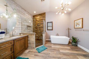 Bathtub, hair dryer, towels, soap