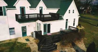 Large farm house in country setting. Wrap around decks, luxury vinyl plank throughout with washer/dryer and huge game room. 5 bedrooms, plenty of room to stretch out and relax. Large pool is available end May - end September.