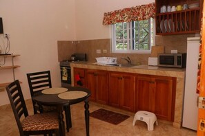 Cottage | Private kitchen | Fridge, microwave, stovetop, cookware/dishes/utensils - Stoney Gate Cottages (Negril)