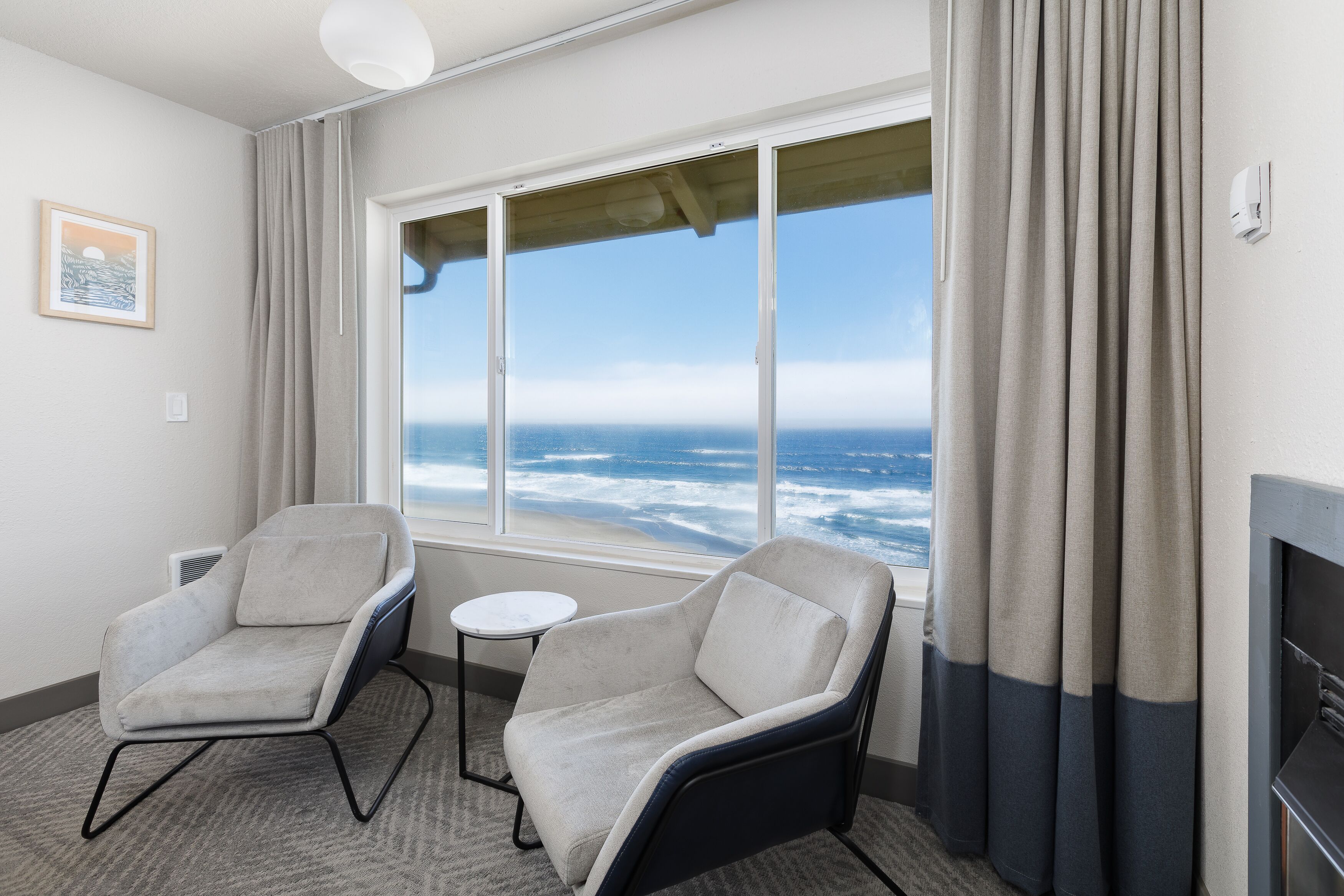 deluxe room, 2 queen beds, fireplace, ocean view | beach/ocean view